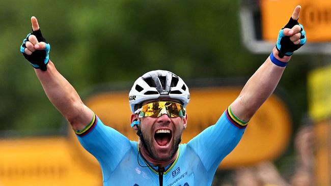 SAINT VULBAS, FRANCE - JULY 03: (EDITOR'S NOTE: Alternate crop) Mark Cavendish of The United Kingdom and Astana Qazaqstan Team celebrates at finish line as stage winner during the 111th Tour de France 2024, Stage 5 a 177.4km stage from Saint-Jean-de-Maurienne to Saint Vulbas / #UCIWT / on July 03, 2024 in Saint Vulbas, France. (Photo by Dario Belingheri/Getty Images)