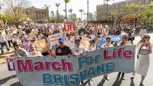 Protesters march through Brisbane’s CBD. Picture: AAP/Glenn Hunt