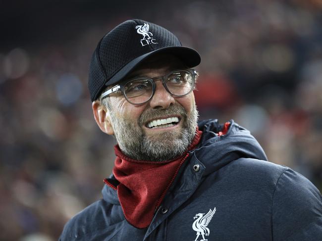 Liverpool's manager Jurgen Klopp smiles before the start of the Champions League group E soccer match between Liverpool and Genk at Anfield Stadium, Liverpool, England, Tuesday, Nov. 5, 2019. (AP Photo/Jon Super)