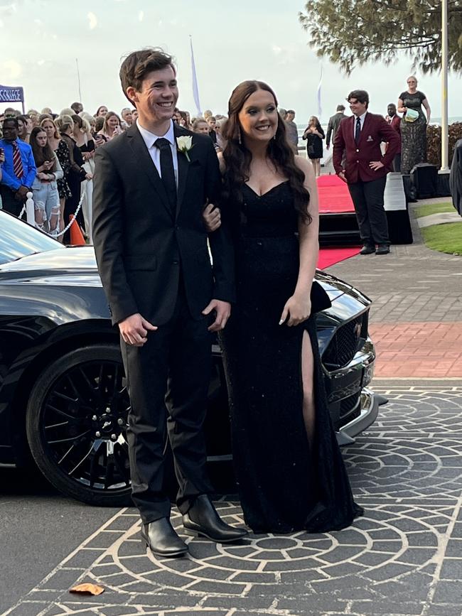 Emma Roberts and Riley List arrive at the formal in a black 2021 Mustang GT.