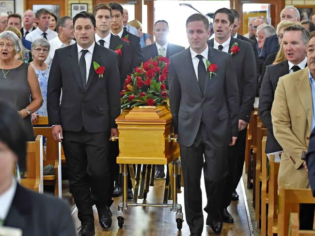 Mr McBride’s family carry the casket into the church. Picture: Troy Snook