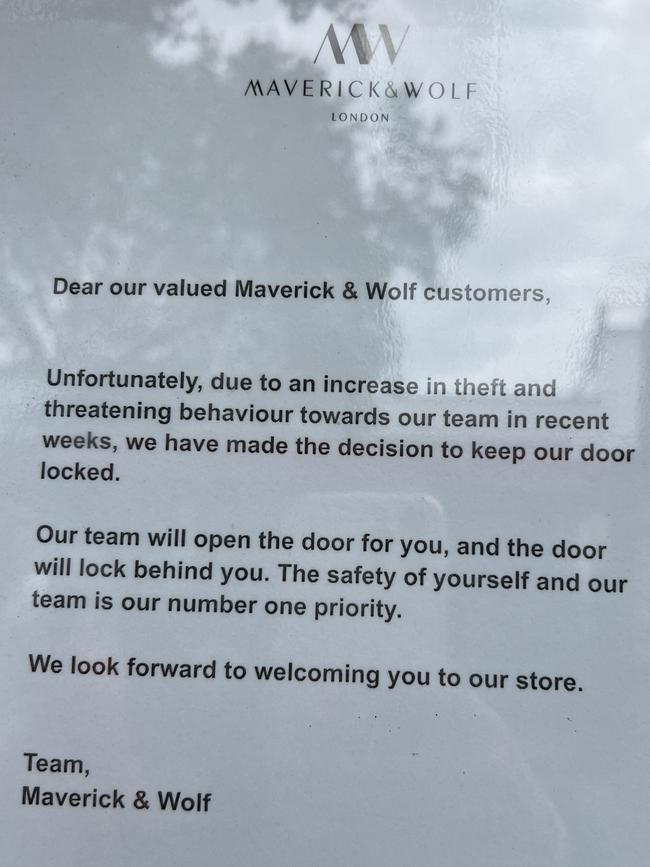 A sign erected at Maverick and Wolf saying why it had locked its main door. Picture: Danielle Gusmaroli