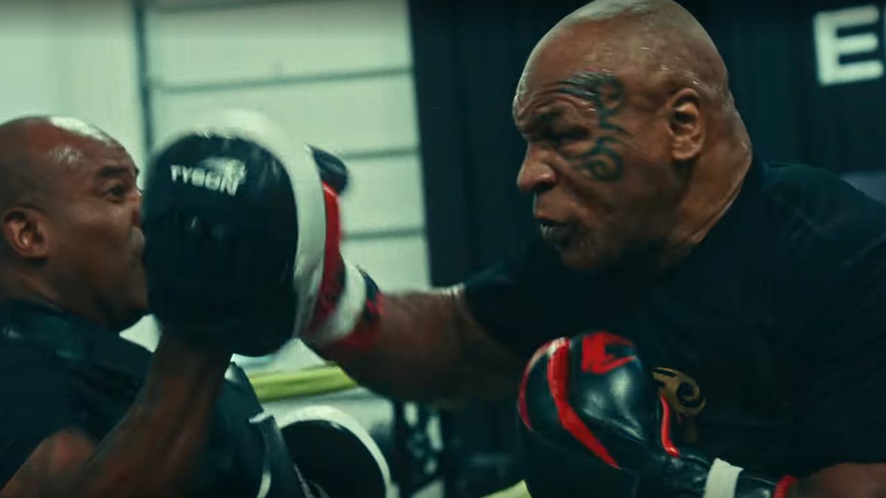 Mike Tyson hitting the pads. Photo: Netflix.