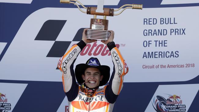 Marc Marquez (93) of Spain celebrates his win in the Grand Prix of the Americas motorcycle race at the Circuit Of The Americas in Austin, Texas, Sunday, April 22, 2018. (AP Photo/Eric Gay)