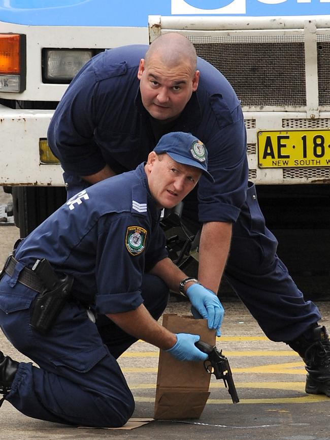 Police seize a gun found at the scene of an armoured security van robbery at Lane Cove.