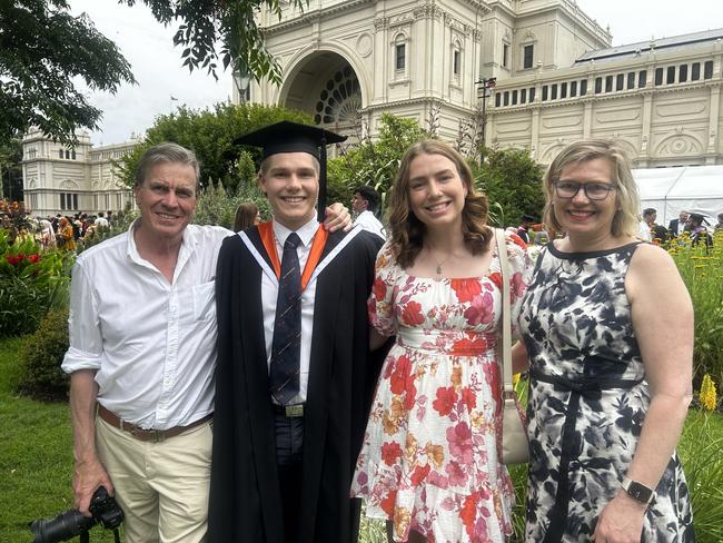 Hamish Nicol, with family, graduates with a Bachelor of Design at the University of Melbourne's Faculty of Architecture, Building and Planning graduation ceremony at the Royal Exhibition Building on December 6, 2024. Picture: Harvey Constable