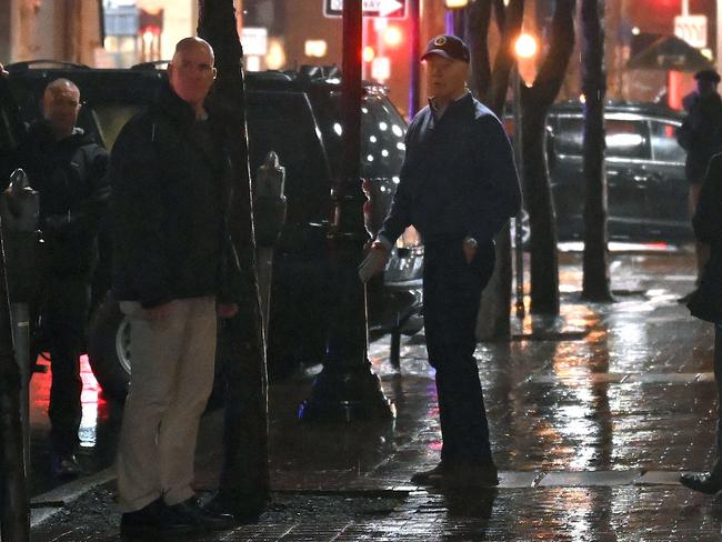 Joe Biden had a surprised expression as a car hit an SUV in the president’s motorcade. Picture: AFP