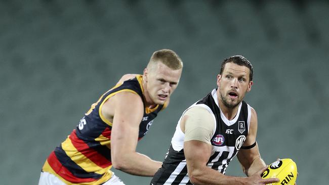 AFL – SHOWDOWN 48 – Port Adelaide v Adelaide Crows at the Adelaide Oval. Travis Boak and Reilly O'Brien Picture SARAH REED