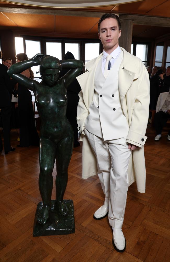 Actor Nicholas Alexander Chavez (he recently starred at Lyle Menendez in “Monsters: The Lyle and Erik Menendez Story”) tried to outpose the statue at the Jacquemus Menswear Fall-Winter 2025/2026 show. Picture: Pascal Le Segretain/Getty Images