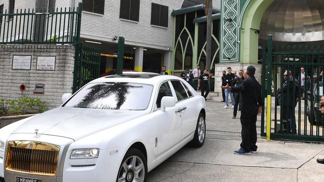 A procession of cars follow the hearse carrying the coffin of Mahmoud 'Mick' Hawi. Picture: AAP Image