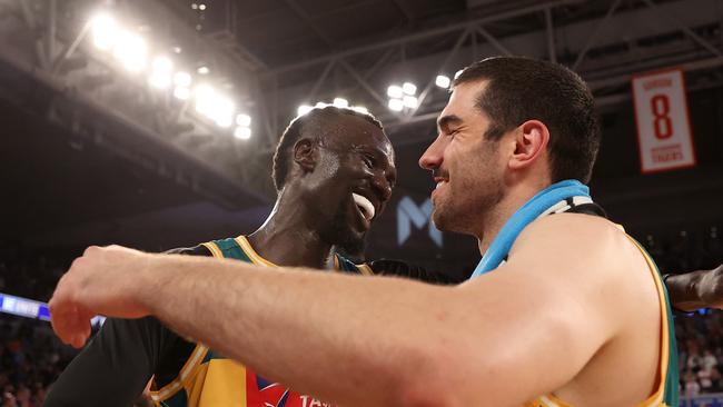 Majok Deng of the JackJumpers and Fabijan Krslovic of the JackJumpers celebrate the win during game three of the NBL Championship Grand Final Series between Melbourne United and Tasmania JackJumpers at John Cain Arena, on March 24, 2024, in Melbourne, Australia. (Photo by Kelly Defina/Getty Images)