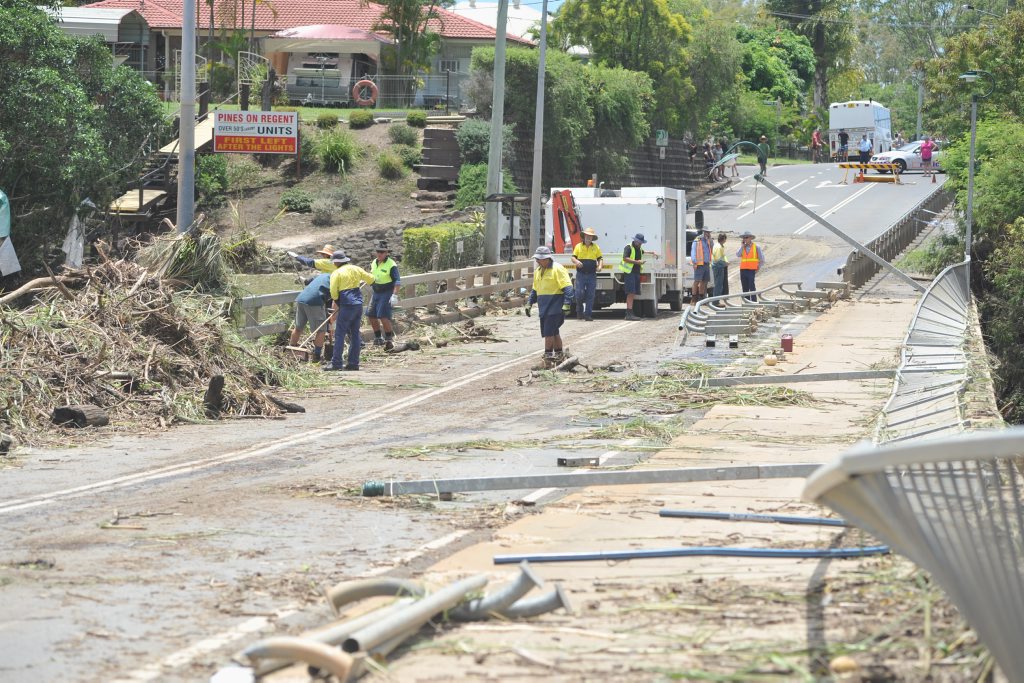 Maryborough floods - work begins on cleaning up the Granville Bridge and reopening it to traffic. Picture: Alistair Brightman