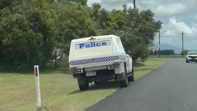 A police vehicle on Martyville Rd, Martyville - south of Innisfail where a man in his 20s was found dead on December 25. Picture: Supplied