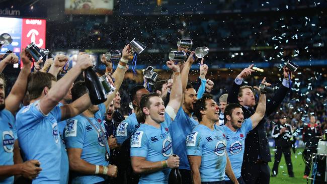 The Waratahs celebrate victory after the Waratahs v Crusaders Super Rugby Final at ANZ Stadium, Sydney. Pic Brett Costello