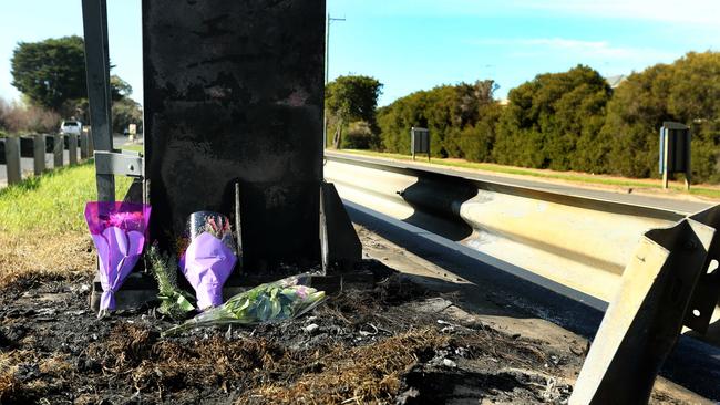 Flowers left at the site of a fatal accident on Portarlington Rd in Newcomb. Picture: Alison Wynd.