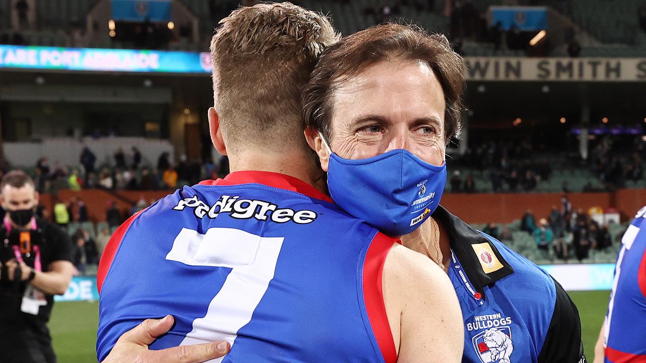 AFL Preliminary Final . September 11 2021 . Port Adelaide vs Western Bulldogs at the Adelaide Oval in Adelaide. Luke Beveridge , Senior Coach of the Bulldogs hugs Lachie Hunter after tonights win over Port Adelaide . Photo by Michael Klein