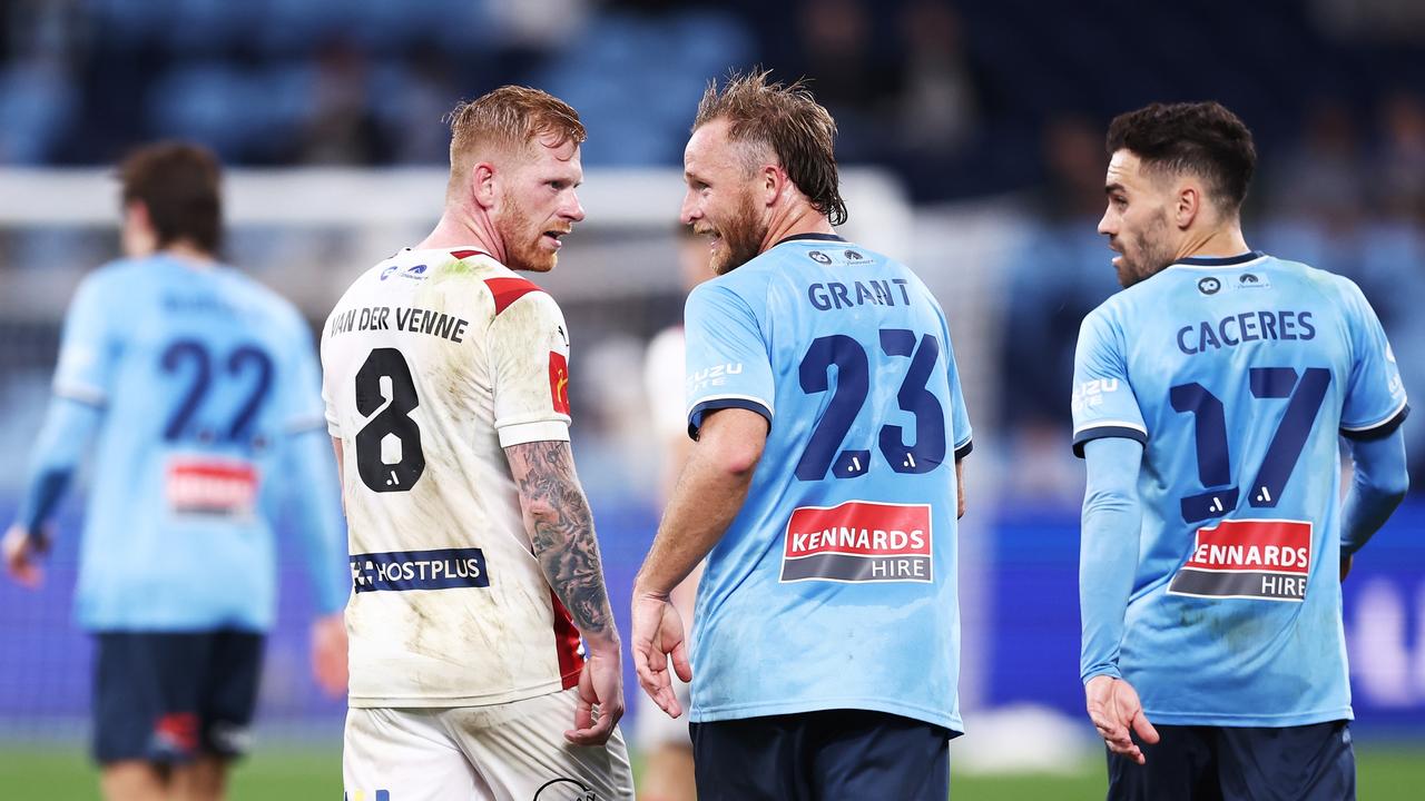 Rhyan Grant of Sydney FC faces off against Richard van der Venne.