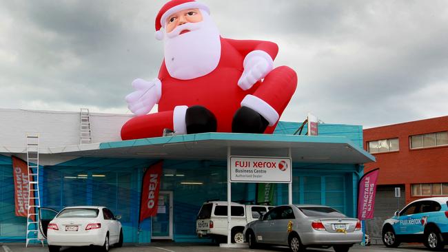 super size Santa on the roof of the former Fuji Xerox shop in Hobart