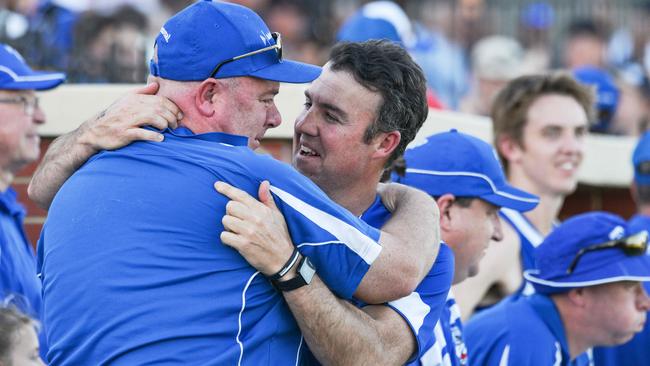 Young hugs former Athelstone coach Jade Sheedy after the clubs 2019 D2 grand final win. Picture: Brenton Edwards