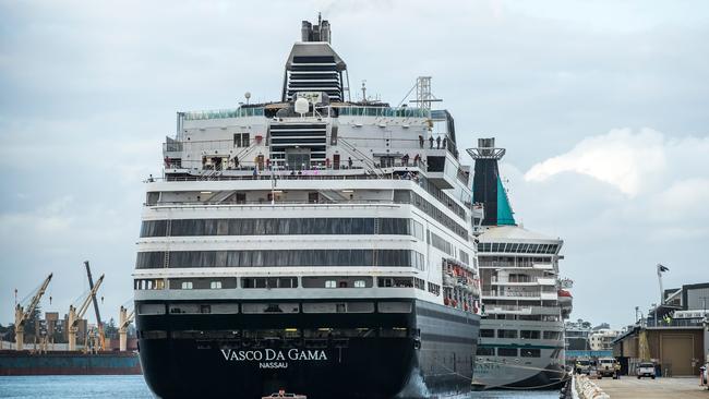 Cruise ship CMV Vasco Da Gama berths behind MV Artania at the port of Fremantle for emergency refuelling and supplies on March 27.