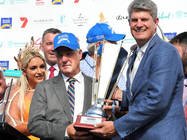 Trainer Gregory Hickman (left) poses for a photograph with Queensland Racing Minister Sterling Hinchcliff after Pierata won race 7, the Magic Millions Three-Years-Old Guineas, during the Gold Coast Magic Millions at Aquis Park, Gold Coast Turf Club, Queensland, Saturday, January 13, 2018. (AAP Image/Albert Perez) NO ARCHIVING, EDITORIAL USE ONLY