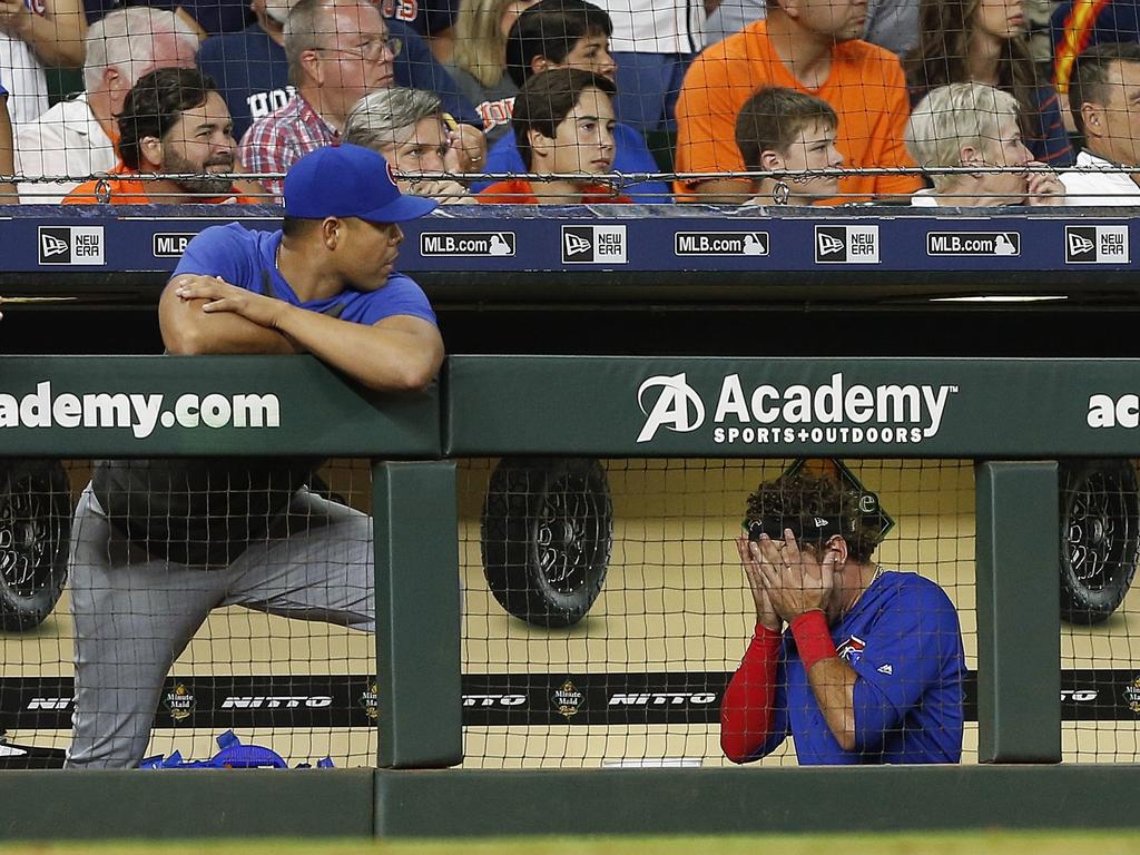 Albert Almora Jr. leaves the game after checking on the young child. Picture: Bob Levey/Getty Images/AFP