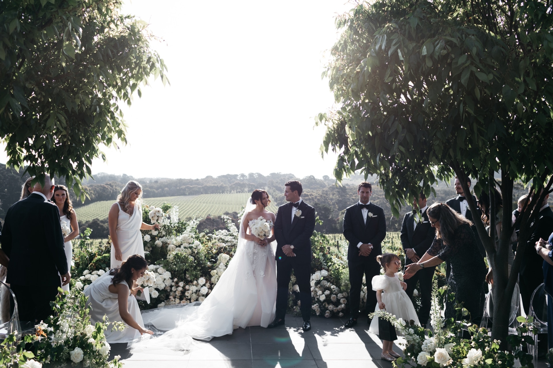 This bride wore pearls and a customised veil for her black-tie wedding ...