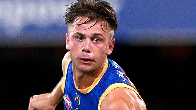 BRISBANE, AUSTRALIA - MAY 05: Harry Sharp of the Lions handballs during the round eight AFL match between the Brisbane Lions and Gold Coast Suns at The Gabba, on May 05, 2024, in Brisbane, Australia. (Photo by Bradley Kanaris/Getty Images)