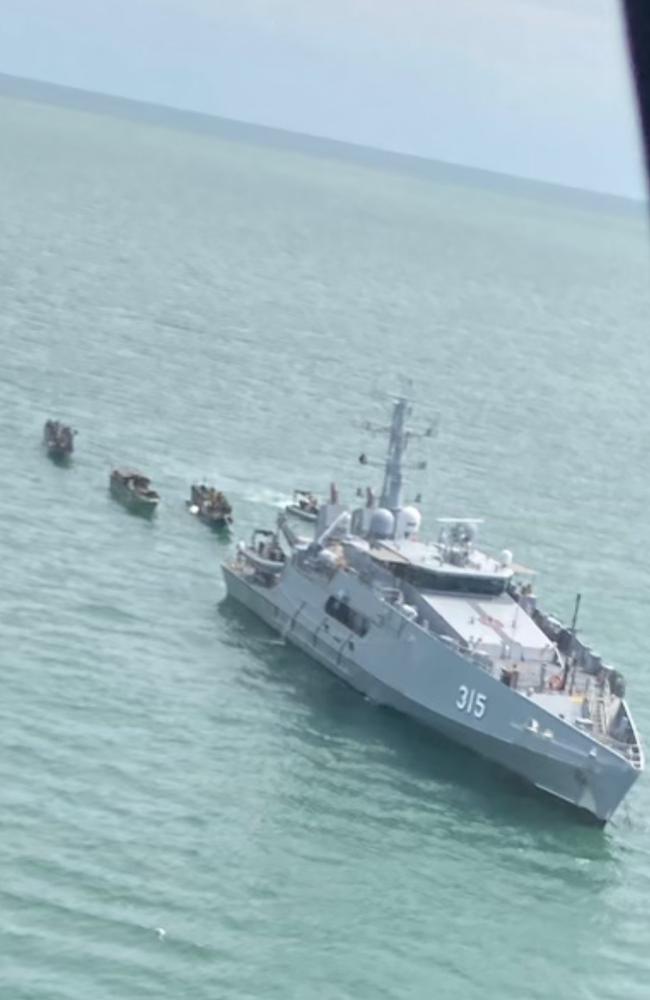 ADV Cape Perron towing the three illegal fishing boats found near Maningrida.