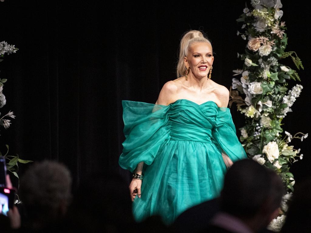 Elaurante designer Louise Owen acknowledges the crowd after her designs were featured on the After 5 Australian Fashion Platform runway at Toowoomba Fashion Festival at The Armitage Centre, Saturday, March 16, 2024.