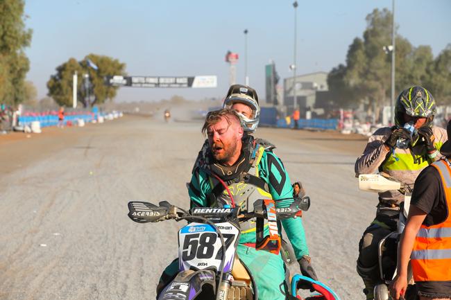 SA's Rohan Irlam looks exhausted after completing the 2019 Tatts Finke Desert Race. Pic: MATT HENDERSON