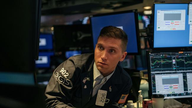 Traders work the floor of the New York Stock Exchange. Picture: AFP