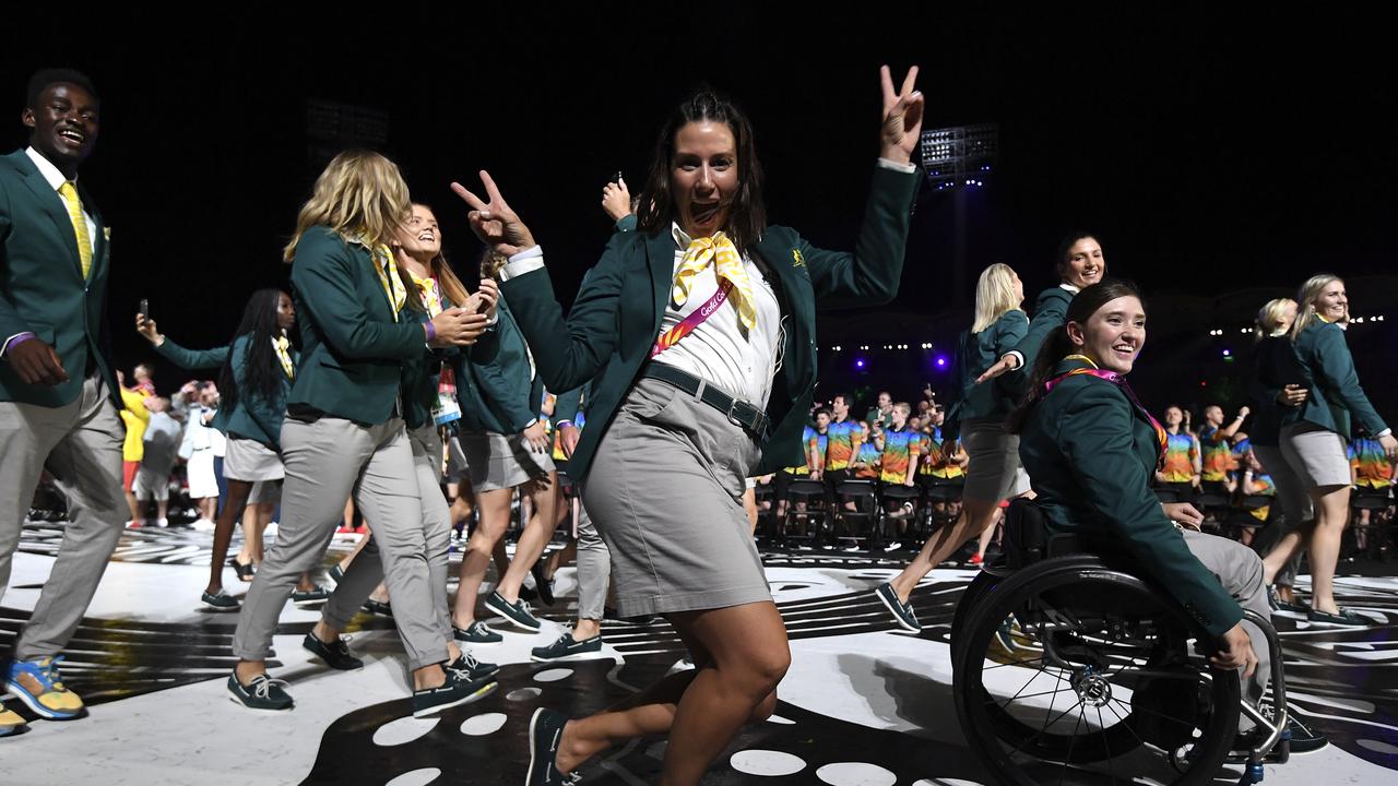 The Australian team make their way into the stadium.