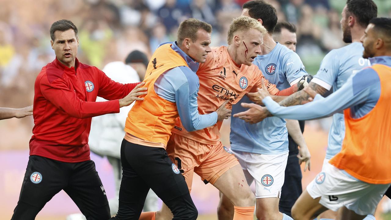 A-League Melbourne derby descends into chaos with violent pitch invasion