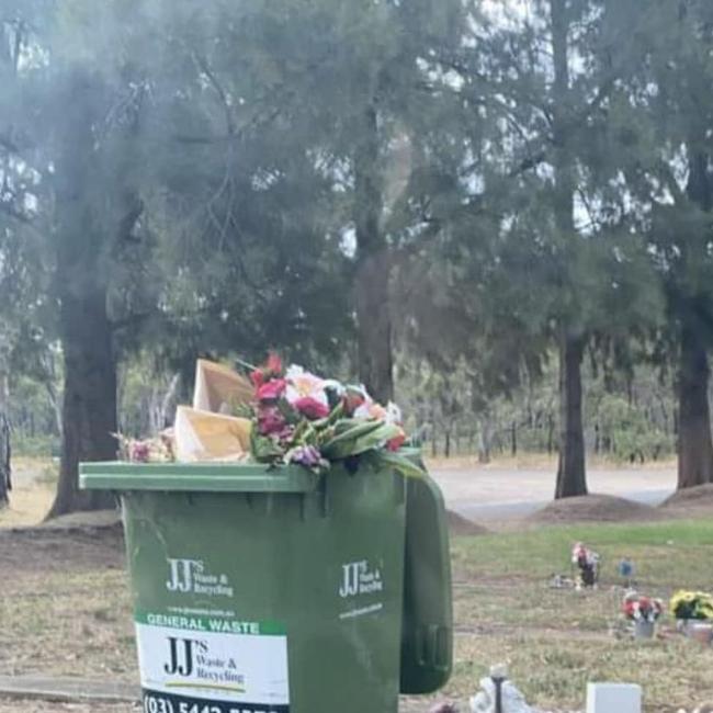 Floral tributes binned at central Victorian cemetery following ornaments ban. Management for the cemetery has denied its staff were involved.