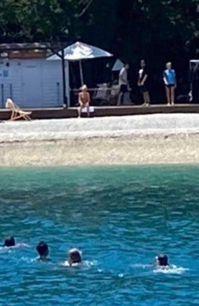 Airlie Beach marine contractor David Edge snapped photos as a person dressed in a blue uniform who reportedly 'screamed at' a group of young swimmers at Daydream Island on January 30, 2022. Picture: Supplied