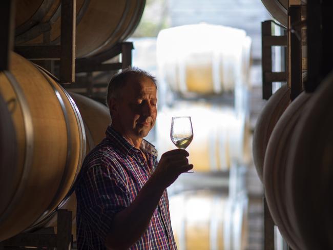 Winemaker Claudio Radenti, of Freycinet Vinyard, samples a glass of his finest in his East Coast cellar. Picture: Tourism Tasmania/Rob Burnett