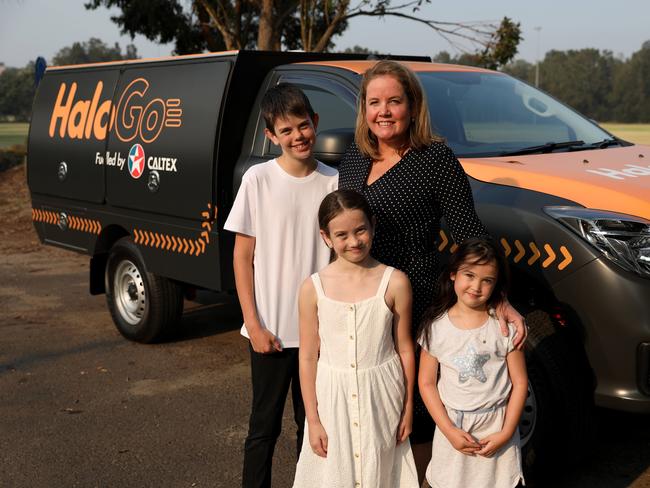 Brigid Shute, with her children Lachie, 11, Piper, 8, and Ellie, 5, came up with the idea as a way to avoid keeping kids in cars while filling up at petrol stations. Picture: Damian Shaw