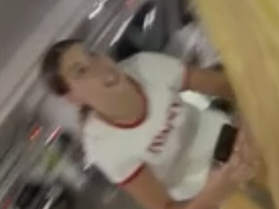 Screen grabs of footage filmed by Bridie Cahill of altercation in a carpark at Westfield Miranda, between Sophie Ganis and Bridie Cahill. Bridie was filming when she was hit by the other car. Photo: Supplied