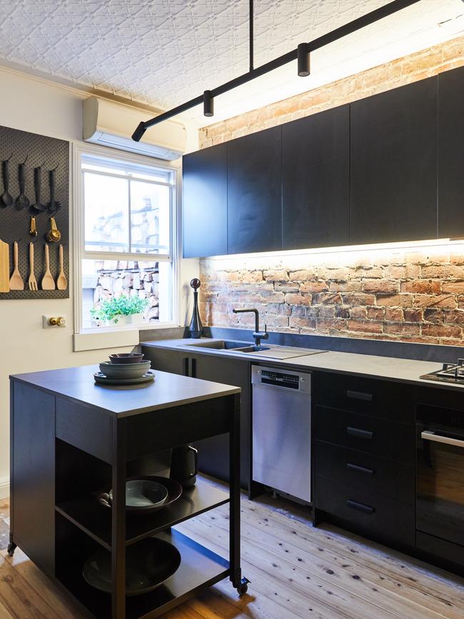 The sleek kitchen after the makeover.