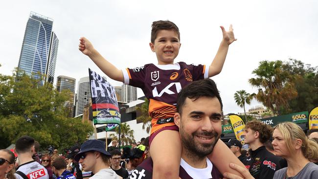 Peter Nicolaou and son Nicholas 4 attend the NRL Fan day.