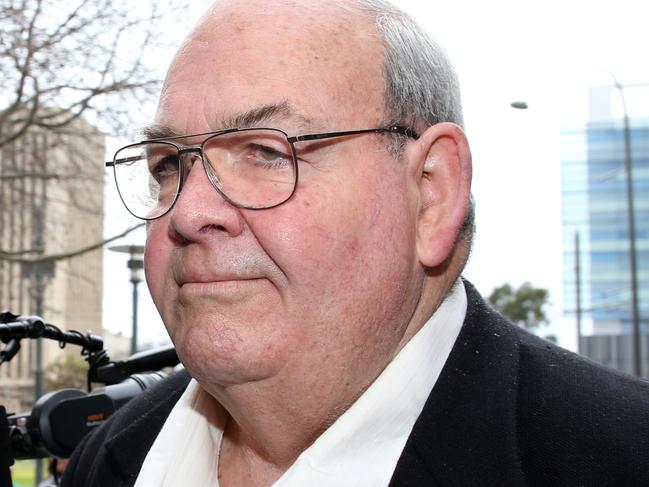 Peter Dansie leaves the Supreme Court in Adelaide, Monday, August 13, 2018. Peter Rex Dansie pleaded not guilty to the drowning murder of his disabled wife, Helen, in 2017. (AAP Image/Kelly Barnes) NO ARCHIVING