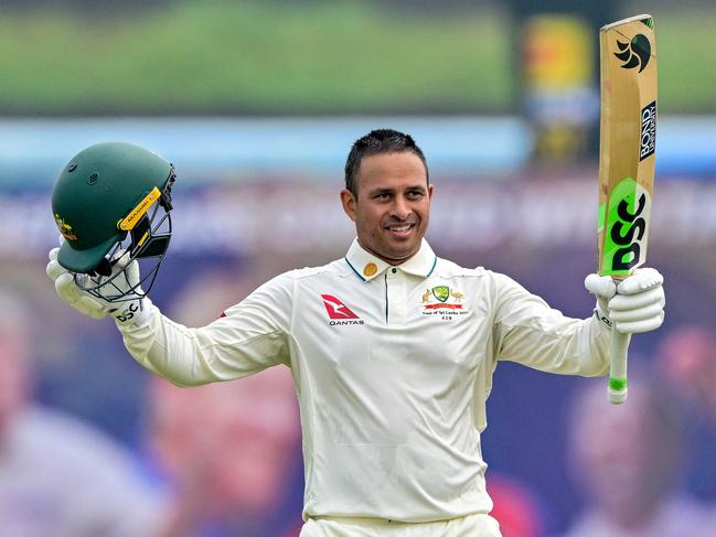 Australia's Usman Khawaja celebrates after scoring a century (100 runs) during the first day of the first Test cricket match between Sri Lanka and Australia at the Galle International Cricket Stadium in Galle on January 29, 2025. (Photo by Ishara S. KODIKARA / AFP)