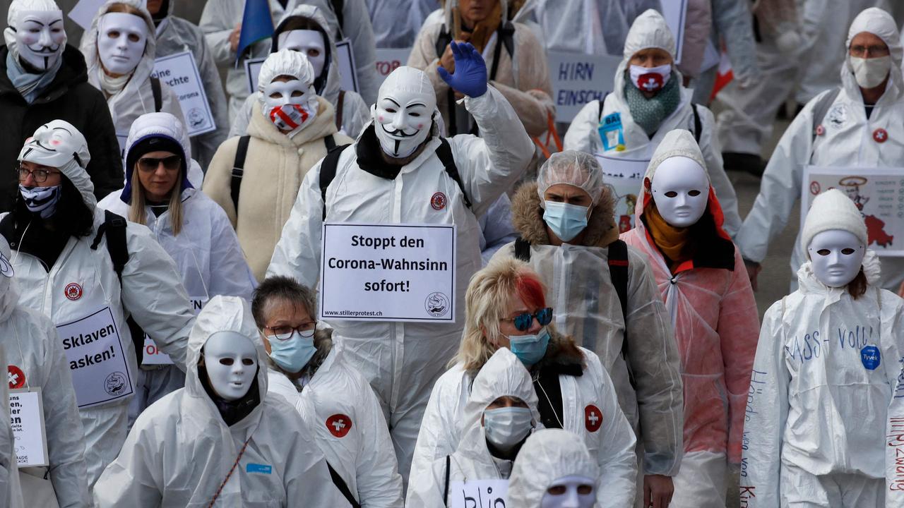 Conspiracy theories, driven by the global health crisis, are taking root in Europe more than ever, drawing inspiration from the QAnon movement in the United States. Picture: Stefan Wermuth/AFP