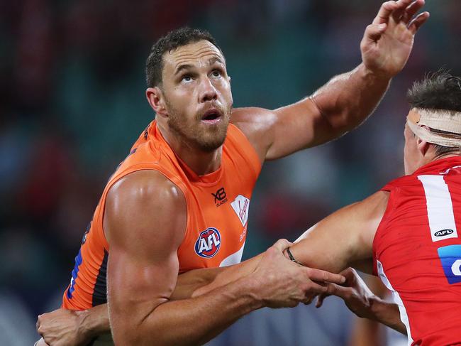 Giants Shane Mumford and Sydney's Callum Sinclair during the AFL Derby match between the Sydney Swans and GWS Giants at the SCG. Picture. Phil Hillyard