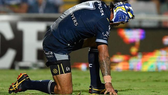 Every time Johnathan Thurston gets knocked down, he gets back up again. Picture: Getty Images