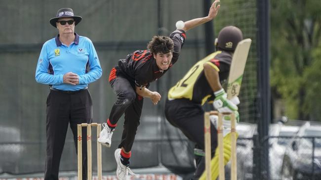 James O'Donnell bowling for Essendon. Picture: Valeriu Campan