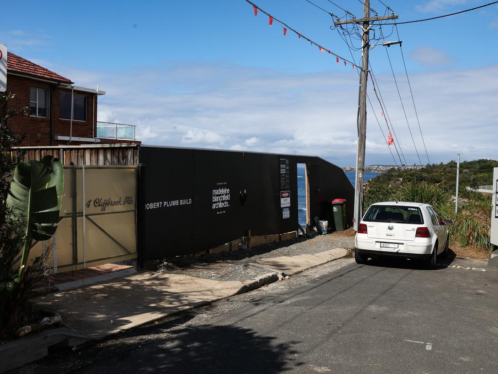 A large black wall covers the street’s iconic ocean view. Photo: NewsWire