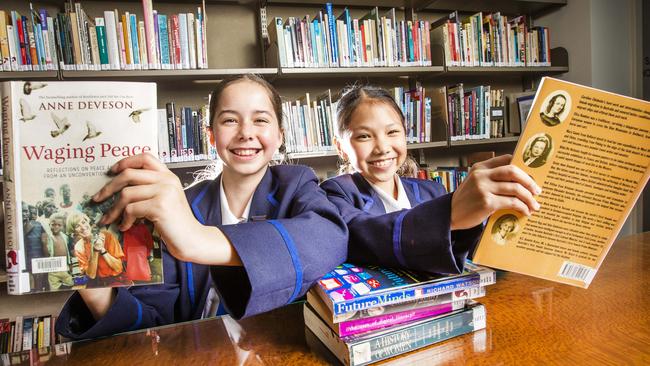 Brisbane Girls Grammar School students Eva Lusk and Aily Chang. Picture: Nigel Hallett