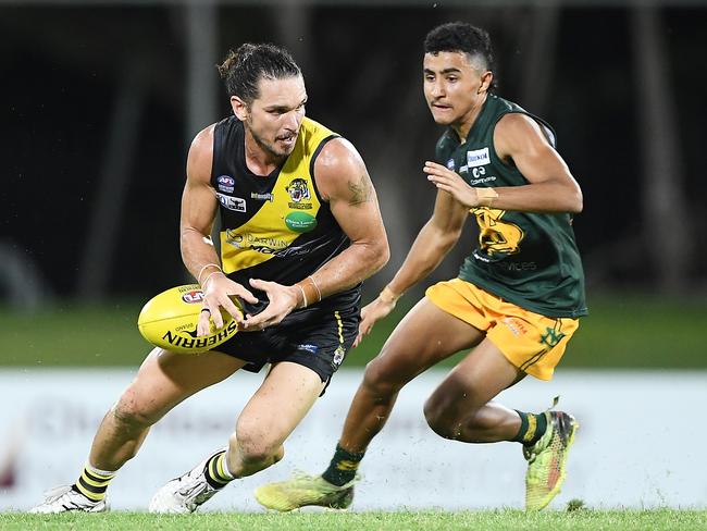 Cam Ilett of Nightcliff Tigers takes on St Mary’s. Picture: Felicity Elliott / AFLNT Media